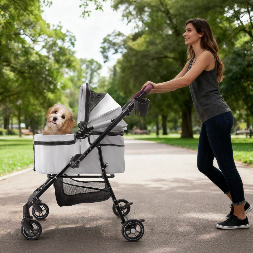 Adjustable canopy pet stroller providing sun and weather protection.